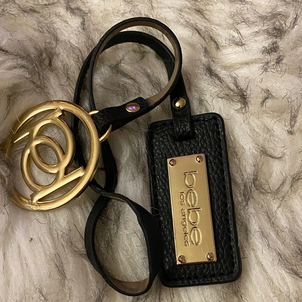 BEBE Black and Gold purse charm
